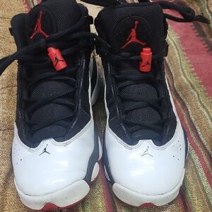 Jordan Kids Black and White Sneakers with Red Accents